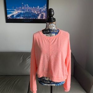 Cold shoulder florescent orange sweat shirt